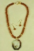 Gold faceted Czech crystal necklace with Mother of Pearl Pendant